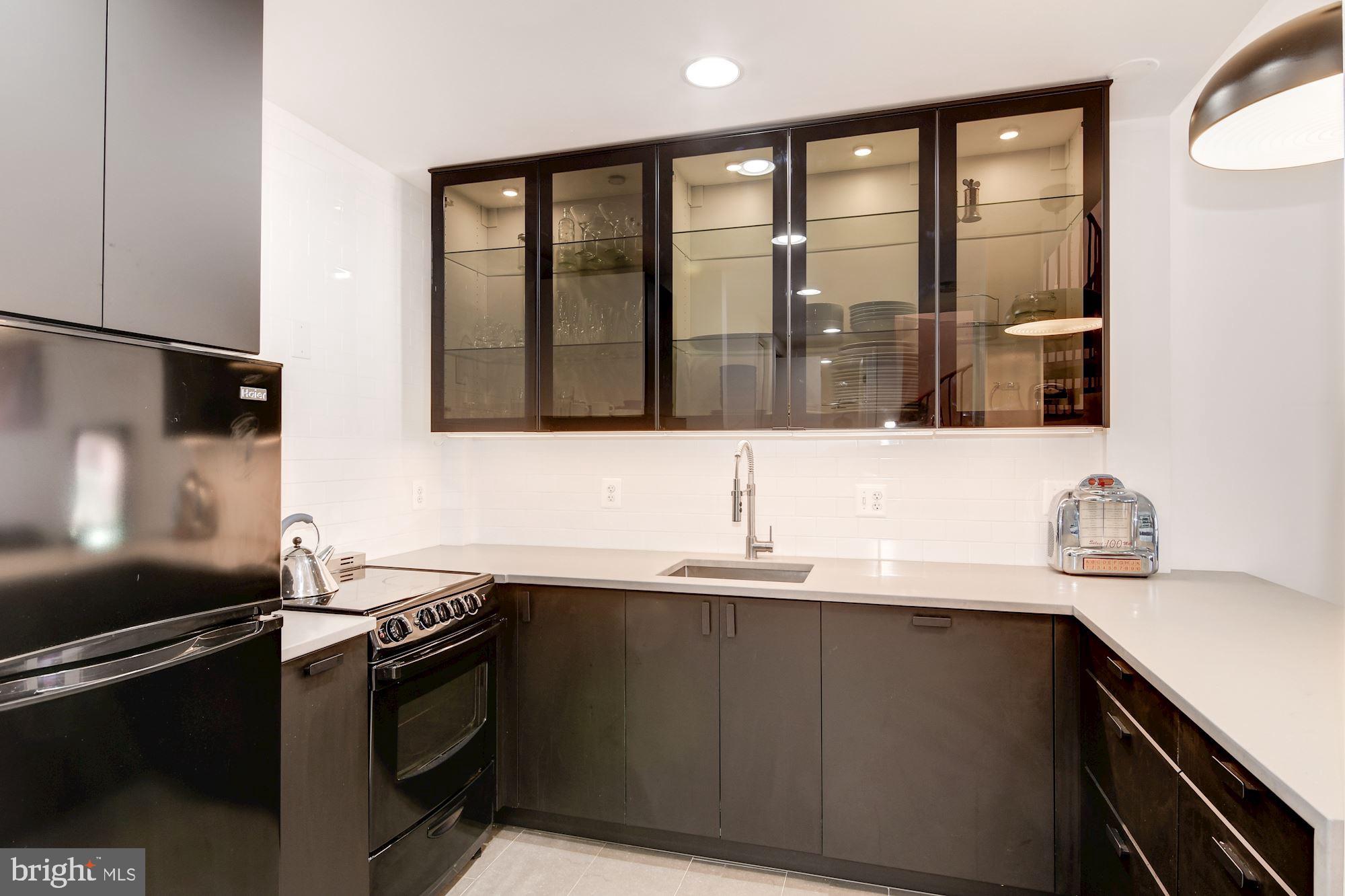 3225 Grace Street Northwest, Unit 208 Washington, DC 20007 - Photo 4 of 16 Updated Kitchen w/quartz countertops