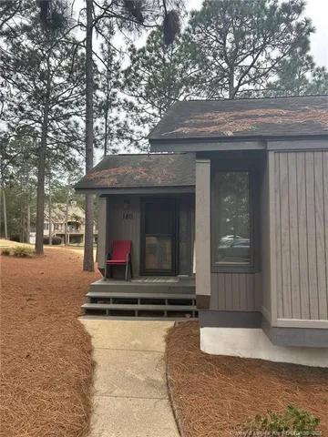 a view of the entrance gate of the house