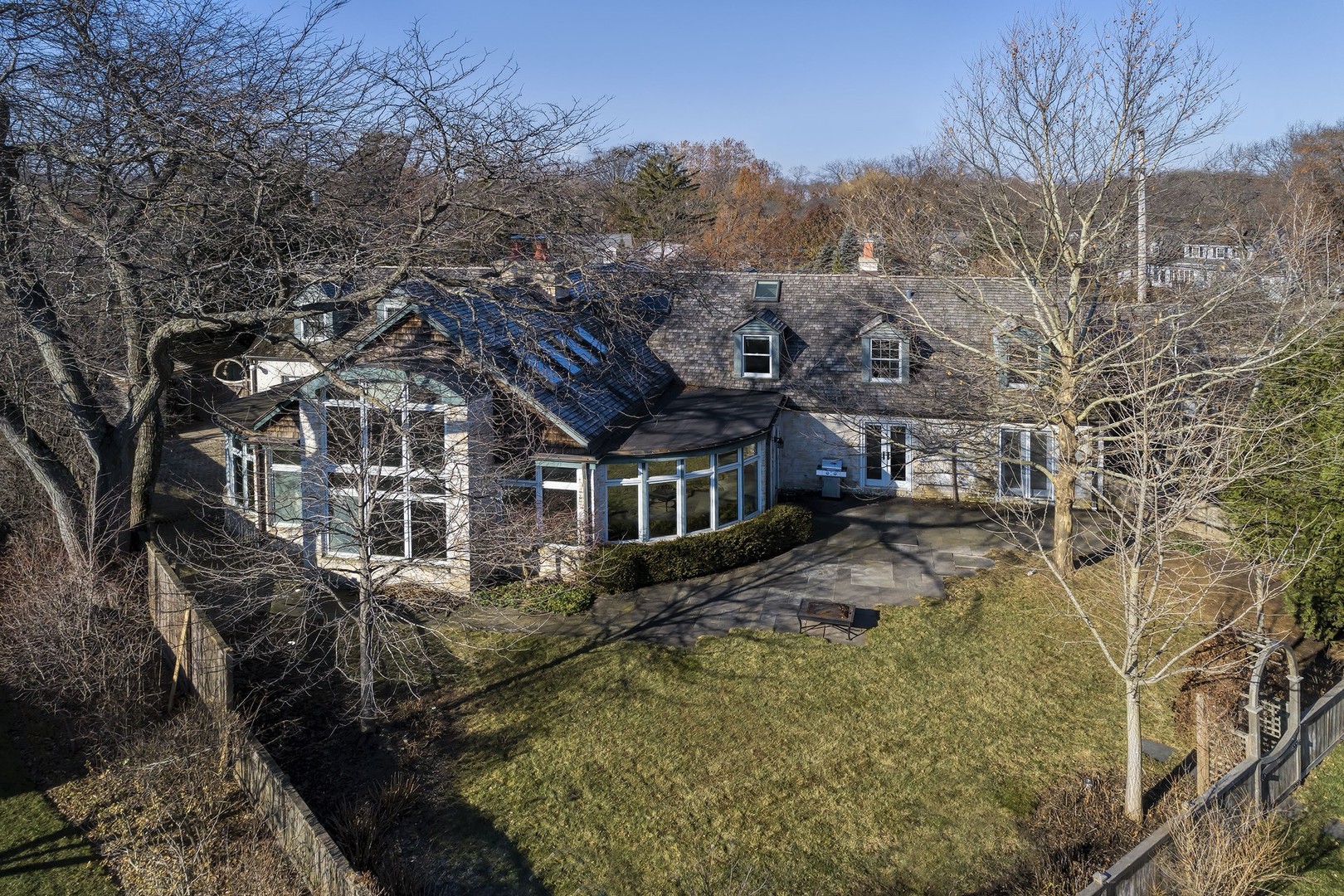 835 Shermer Road Northbrook, IL 60062 - Photo 3 of 39 a aerial view of a house with a yard and large trees