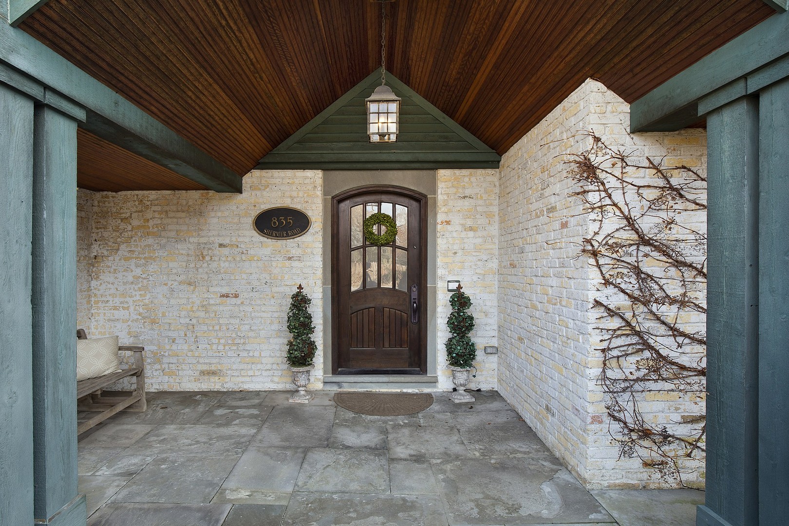 835 Shermer Road Northbrook, IL 60062 - Photo 4 of 39 a front view of a house with garden