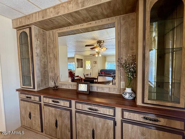2605 South Tomahawk Road, Unit 46 Apache Junction, AZ 85119 - Photo 22 of 47 a kitchen with a refrigerator and countertop