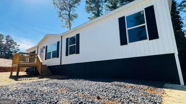 a view of a house with a large window