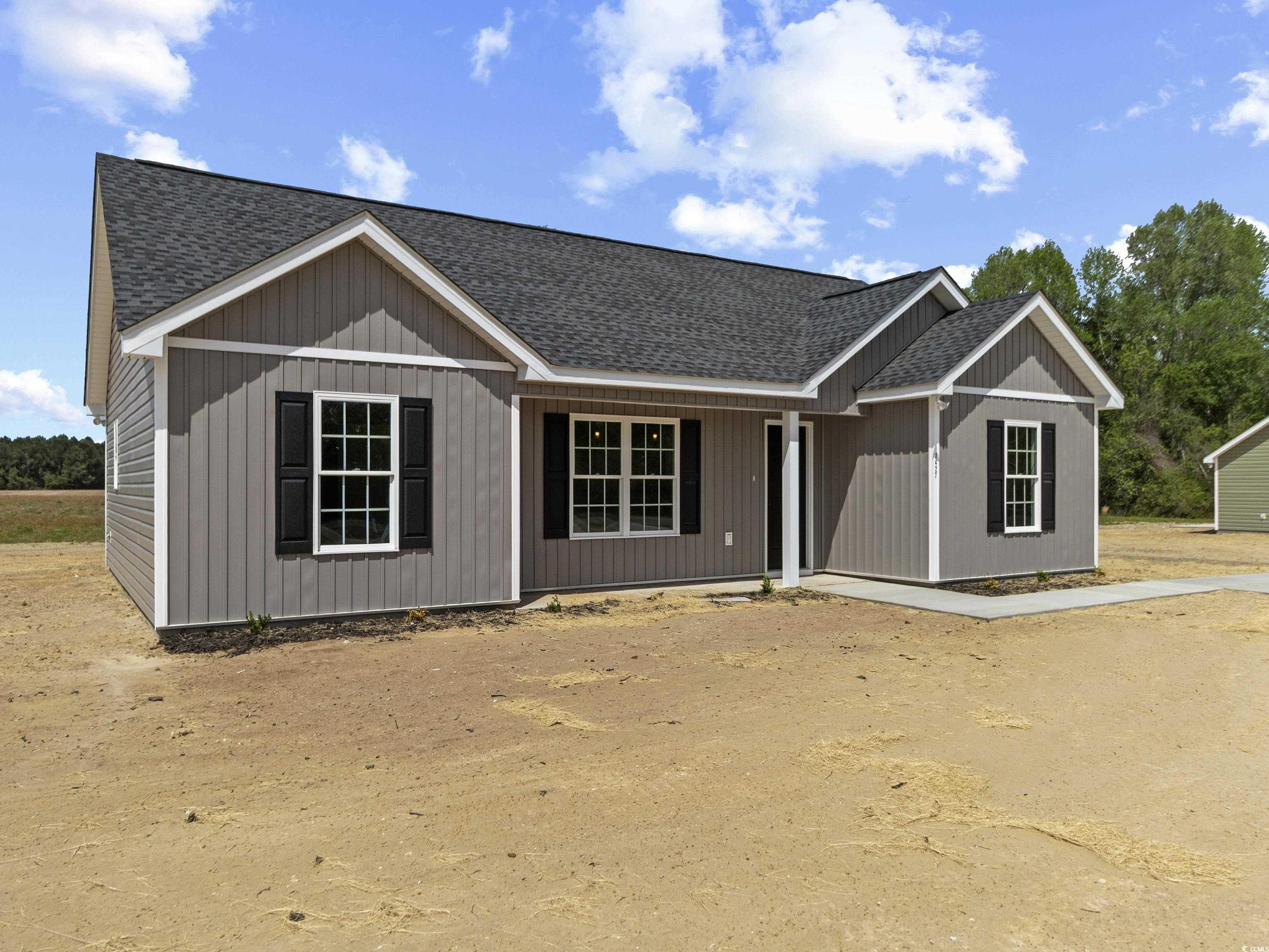 3427 B And S Road Loris, SC 29569 - Photo 3 of 33 View of front of house with a shingled roof