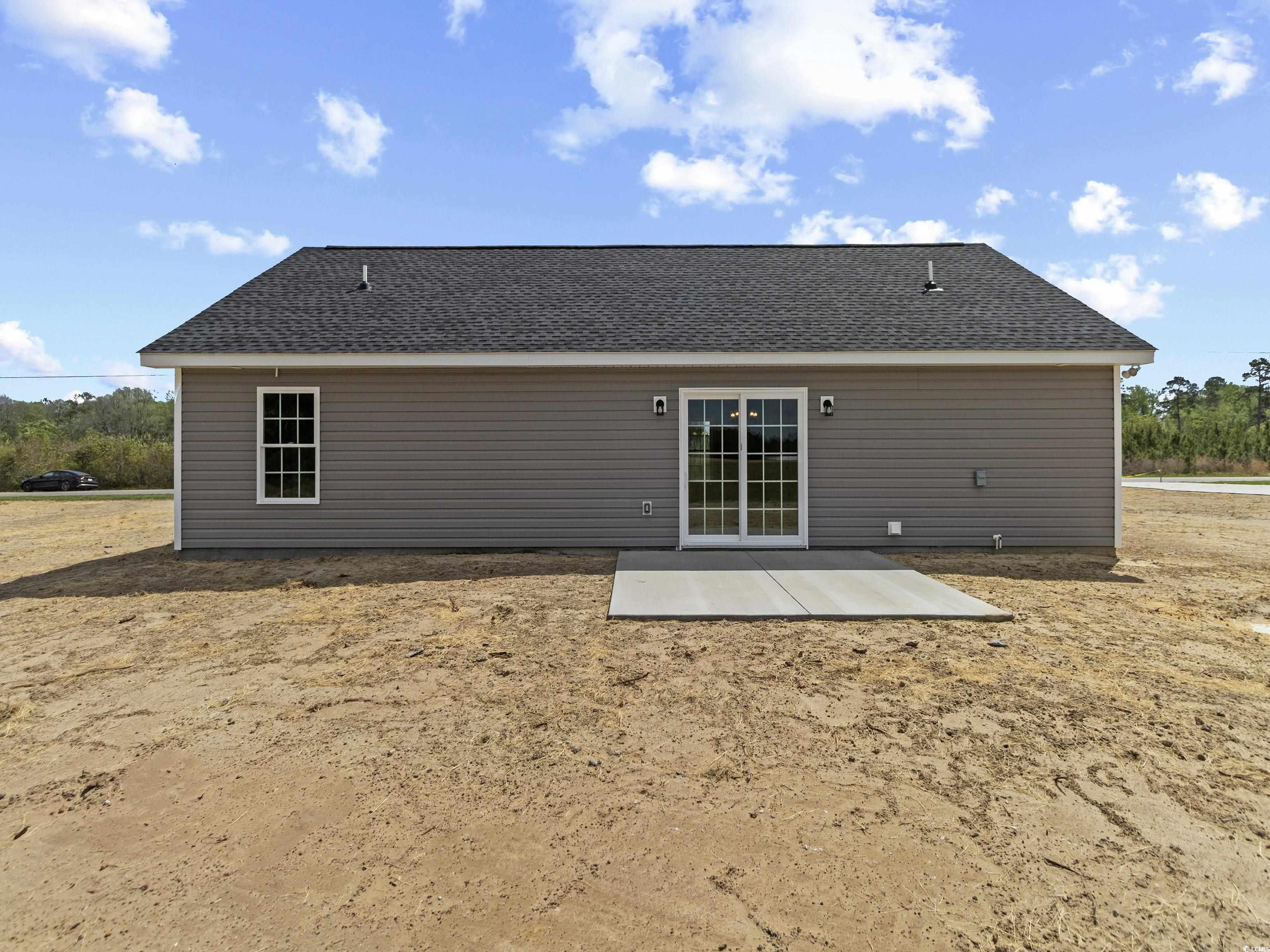 3427 B And S Road Loris, SC 29569 - Photo 6 of 33 Rear view of house featuring a patio area