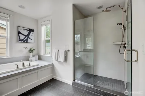 a bathroom with a double vanity sink