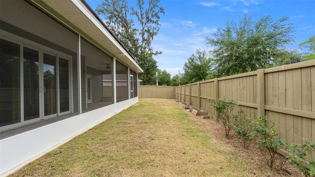 6657 Southwest 15 Place Gainesville, FL 32607 - Photo 24 of 26 a view of a backyard