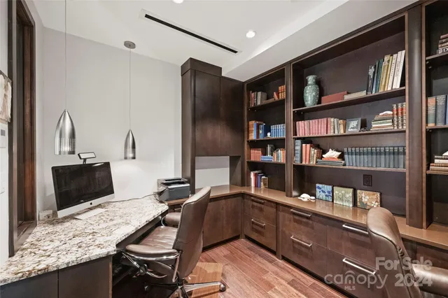 a view of a workspace with furniture