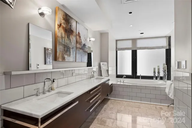 a bathroom with a sink and a bathtub