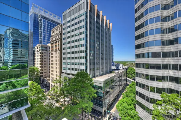 a view of a city with tall buildings