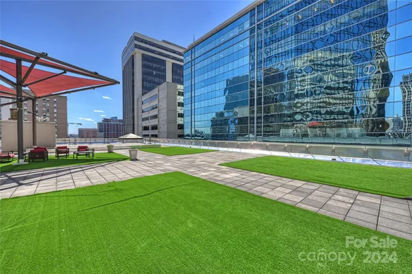 a view of a building and a yard