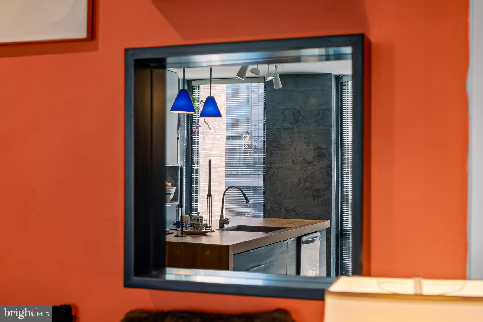 1407 Jordan Street Baltimore, MD 21217 - Photo 24 of 75 Chic kitchen view framed in vibrant hues.