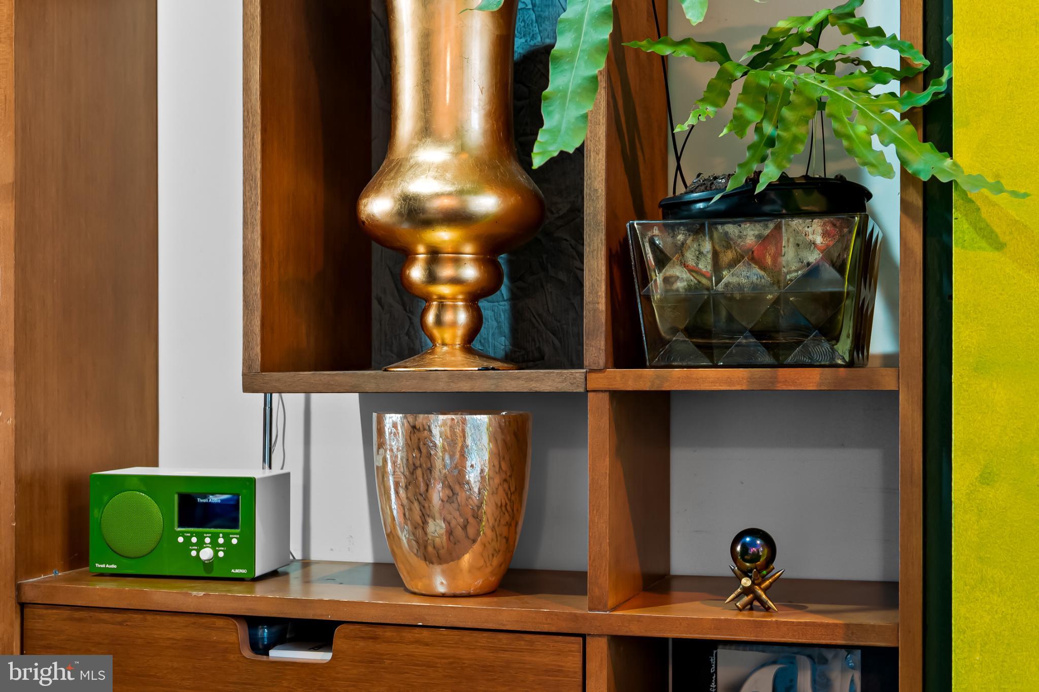 1407 Jordan Street Baltimore, MD 21217 - Photo 26 of 75 a view of fireplace with a potted plant on a table