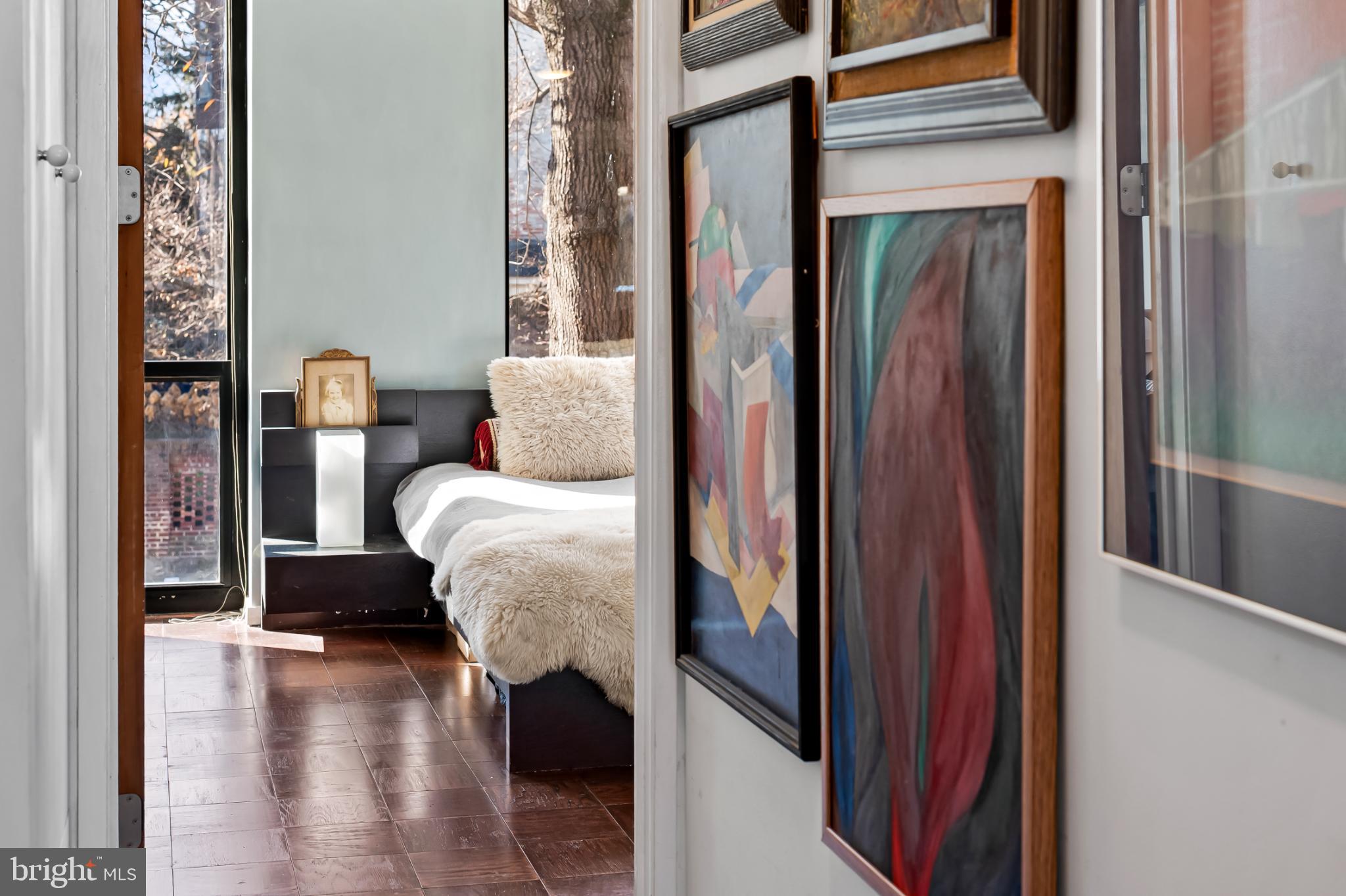 1407 Jordan Street Baltimore, MD 21217 - Photo 34 of 75 a living room with furniture and a wooden floor