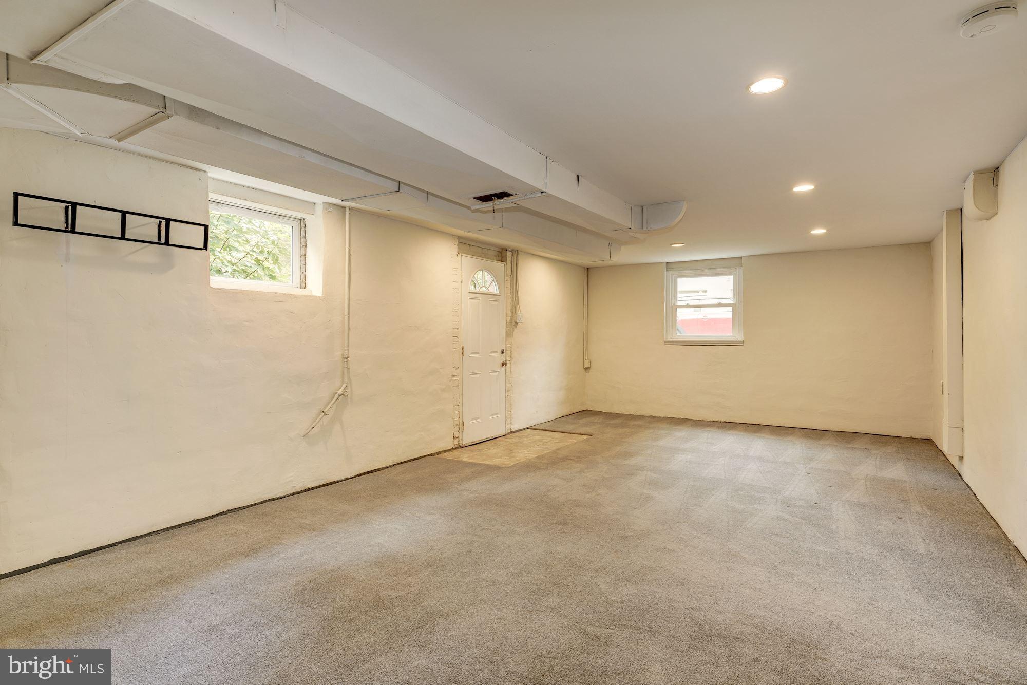 1608 Grace Church Road Silver Spring, MD 20910 - Photo 16 of 26 Large family room and access to outside.