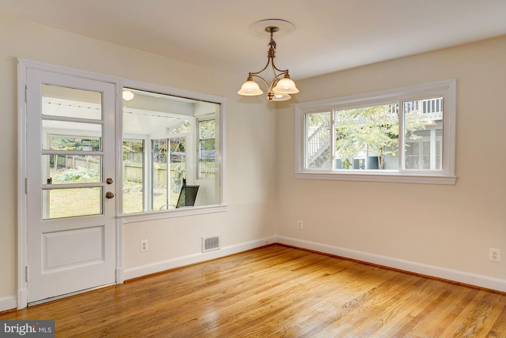 1608 Grace Church Road Silver Spring, MD 20910 - Photo 5 of 26 Dining area and door to outside enclosed porch