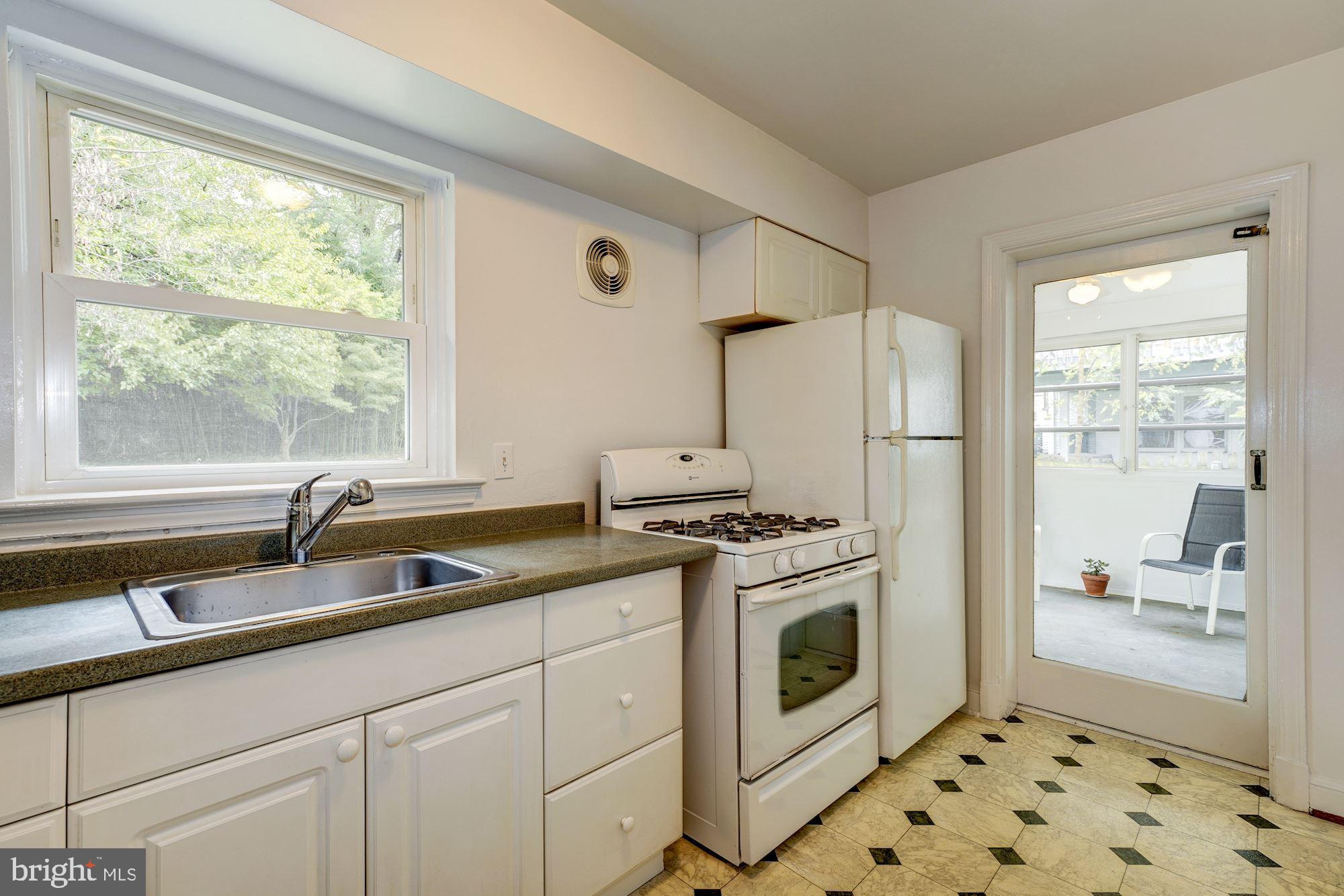 1608 Grace Church Road Silver Spring, MD 20910 - Photo 7 of 26 Kitchen has a second door to the enclosed porch