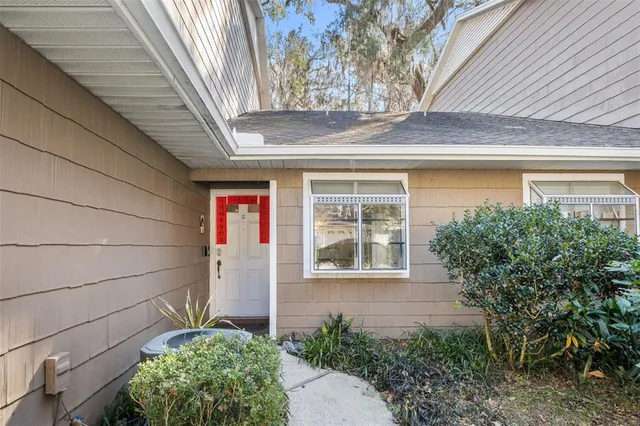 a front view of a house with a garage