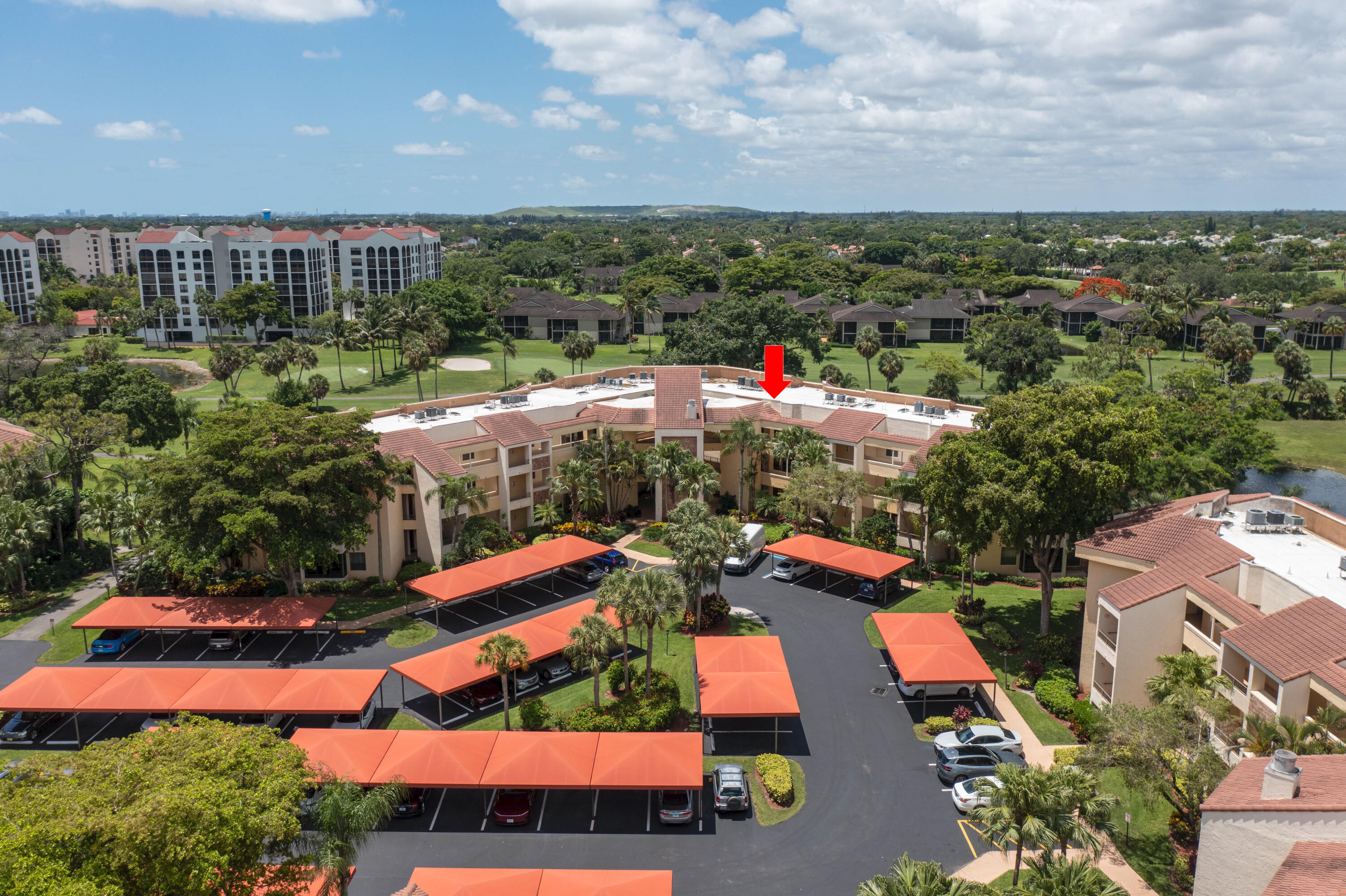 an aerial view of residential houses and outdoor space