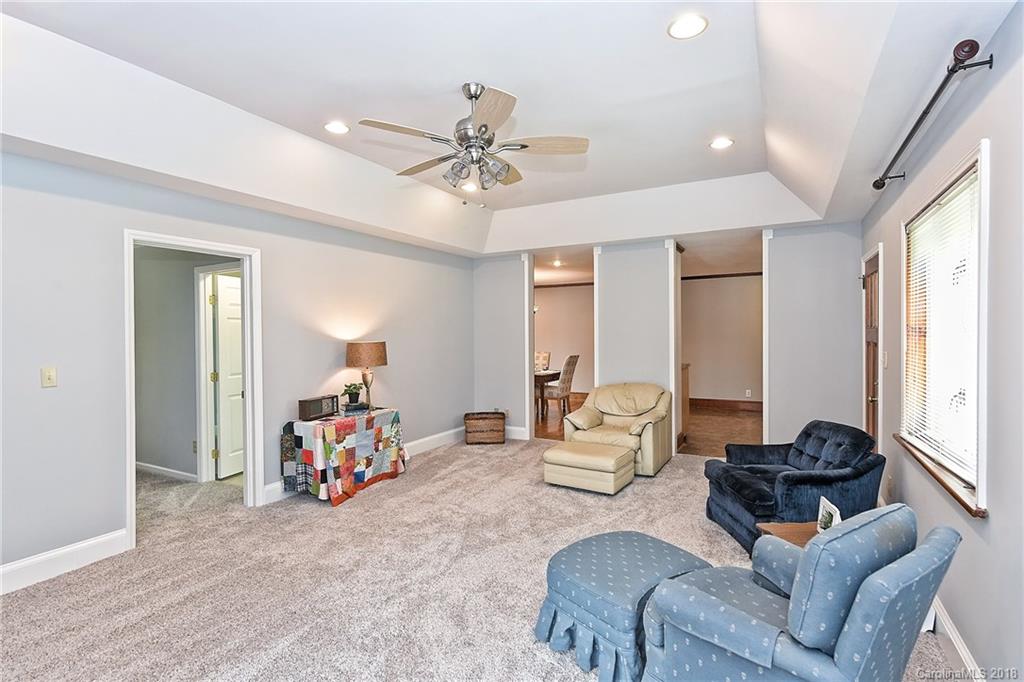 4917 Morgan Mill Road Monroe, NC 28110 - Photo 21 of 36 a living room with furniture and a large window