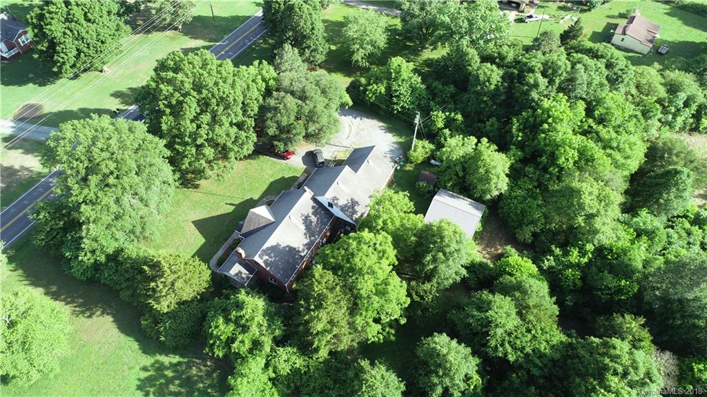 4917 Morgan Mill Road Monroe, NC 28110 - Photo 4 of 36 an aerial view of a house with yard