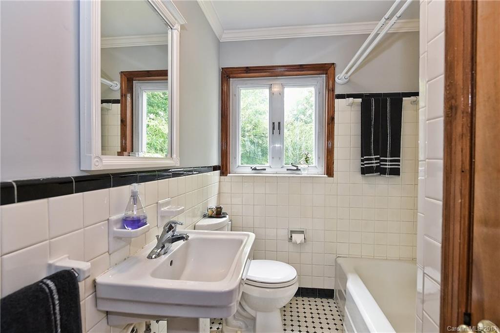 4917 Morgan Mill Road Monroe, NC 28110 - Photo 31 of 36 a bathroom with a sink toilet and shower