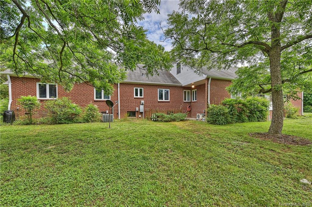 4917 Morgan Mill Road Monroe, NC 28110 - Photo 33 of 36 a front view of house with yard and green space