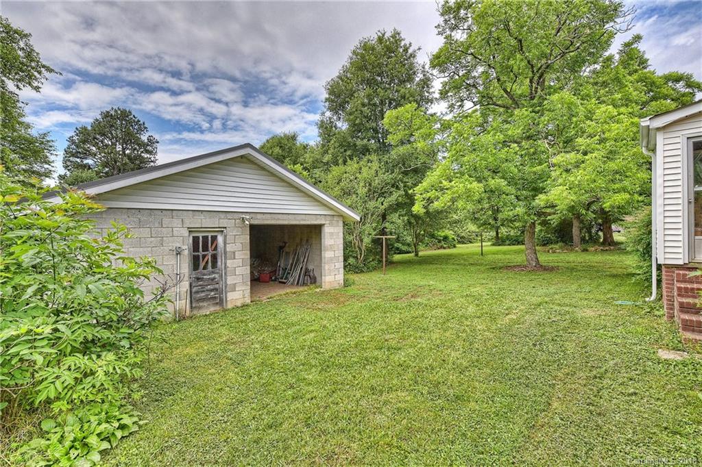 4917 Morgan Mill Road Monroe, NC 28110 - Photo 36 of 36 a front view of house with yard and trees