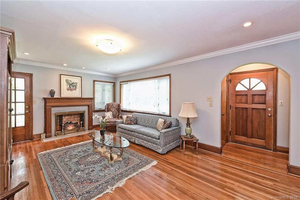 4917 Morgan Mill Road Monroe, NC 28110 - Photo 5 of 36 a living room with furniture and a fireplace