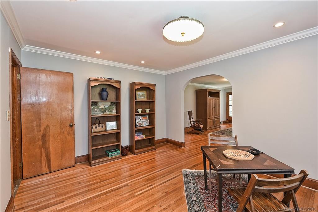 4917 Morgan Mill Road Monroe, NC 28110 - Photo 10 of 36 a room with furniture and wooden floor