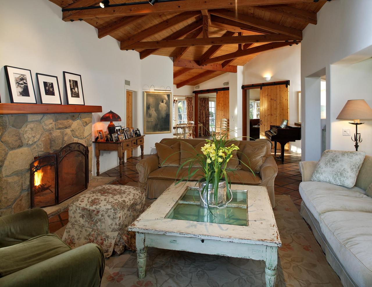 655 Parra Grande Lane Montecito, CA 93108 - Photo 5 of 8 a living room with furniture and a fireplace