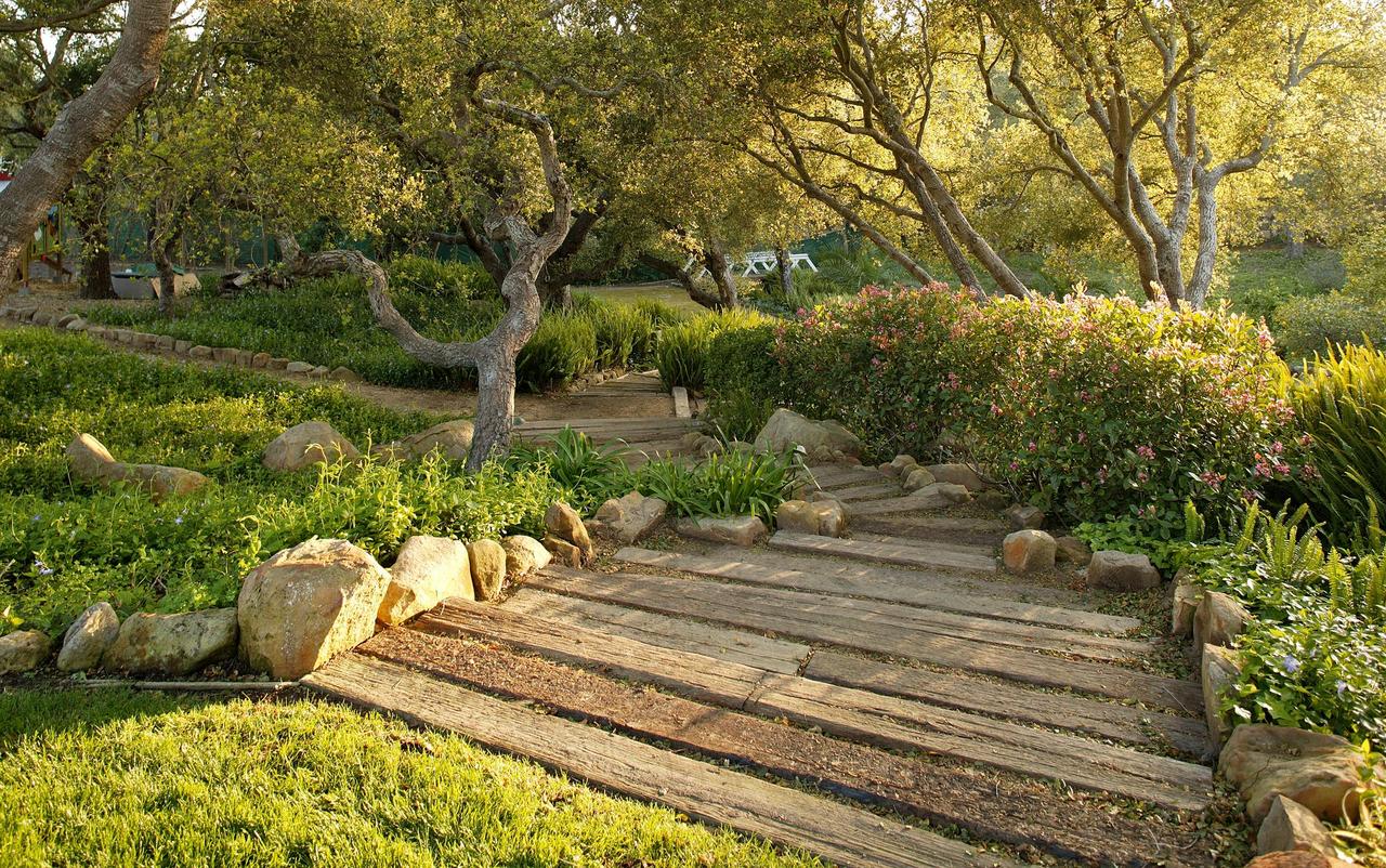 655 Parra Grande Lane Montecito, CA 93108 - Photo 7 of 8 a view of a backyard with plants and a garden