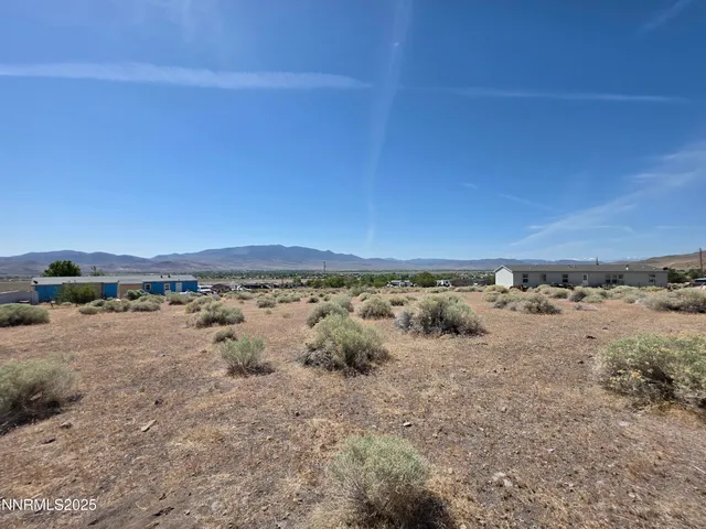 a view of a road with an ocean view