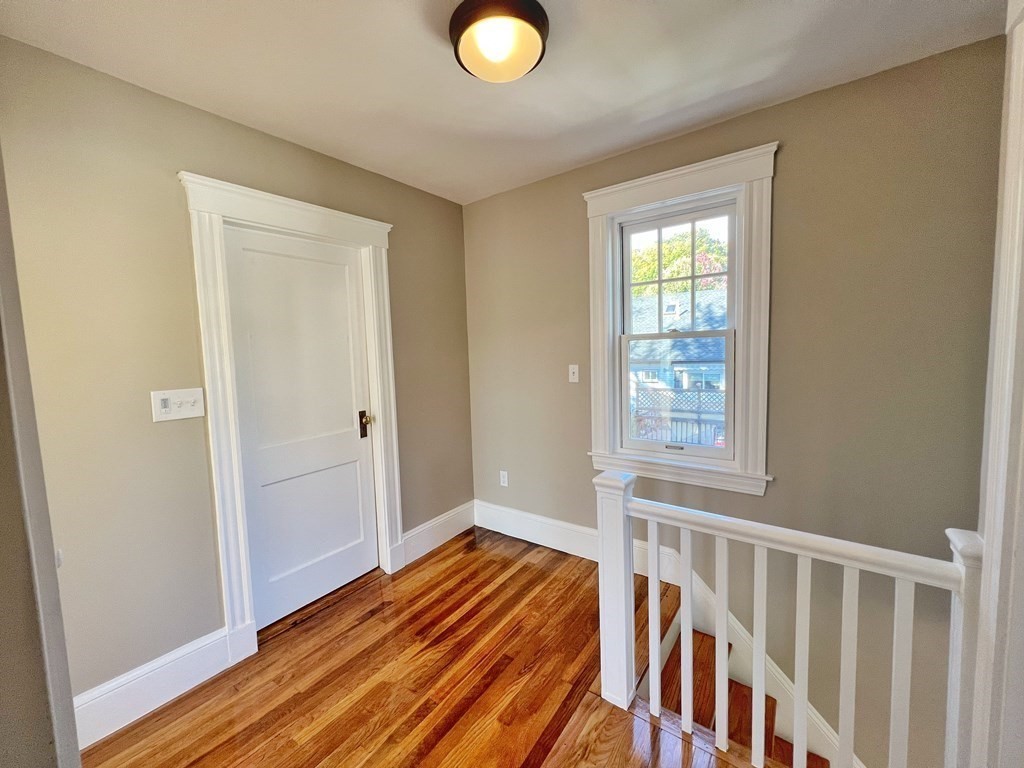 10 Governor Road Arlington, MA 02474 - Photo 15 of 22 a view of entryway with wooden floor