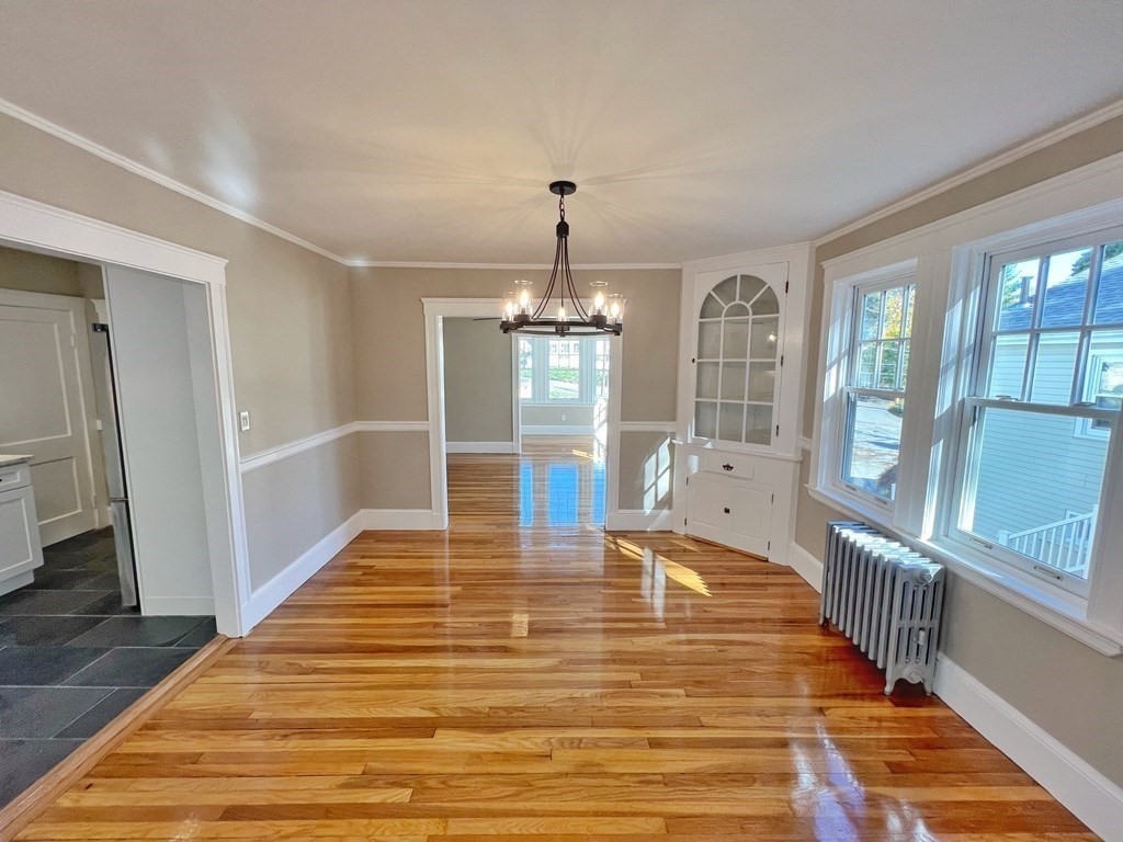 10 Governor Road Arlington, MA 02474 - Photo 5 of 22 a view of an entryway with wooden floor and door