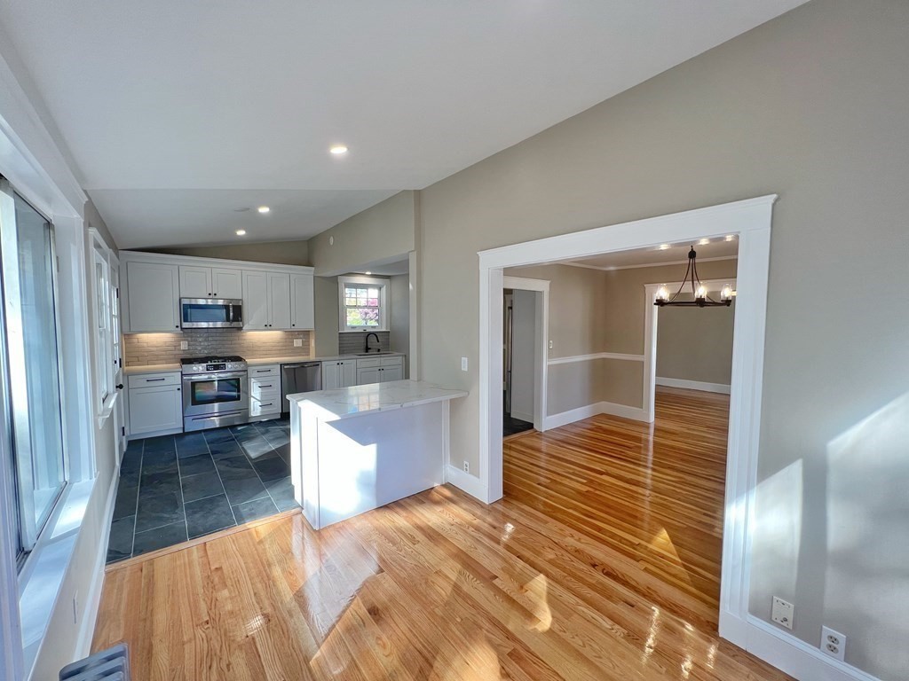 10 Governor Road Arlington, MA 02474 - Photo 8 of 22 a room with stainless steel appliances furniture a kitchen view and a window