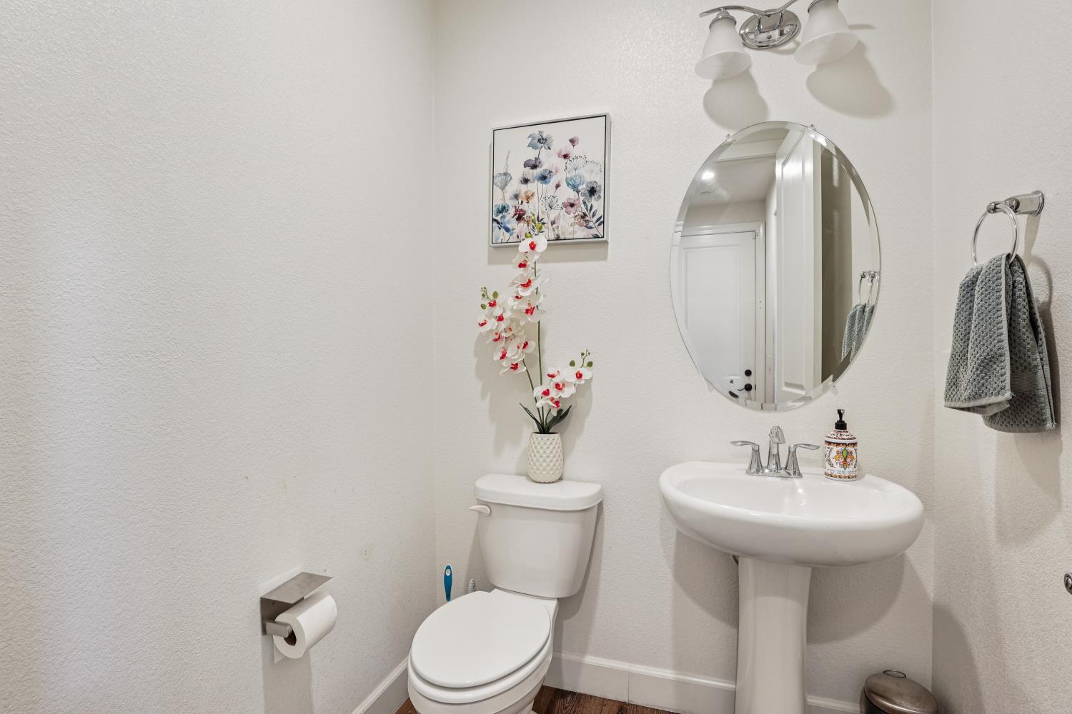 2371 Rio Grande Drive Tracy, CA 95377 - Photo 18 of 61 a bathroom with a sink toilet and a mirror