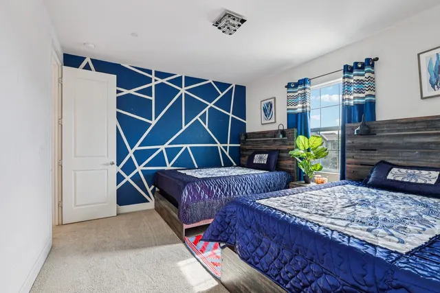 a kitchen with stainless steel appliances a sink and a stove