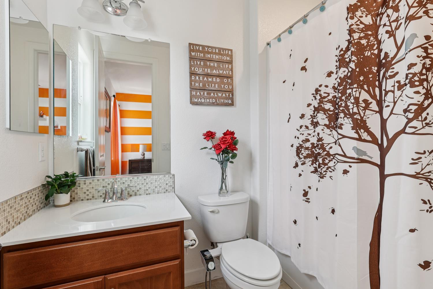 2371 Rio Grande Drive Tracy, CA 95377 - Photo 34 of 61 a bathroom with a sink toilet and shower