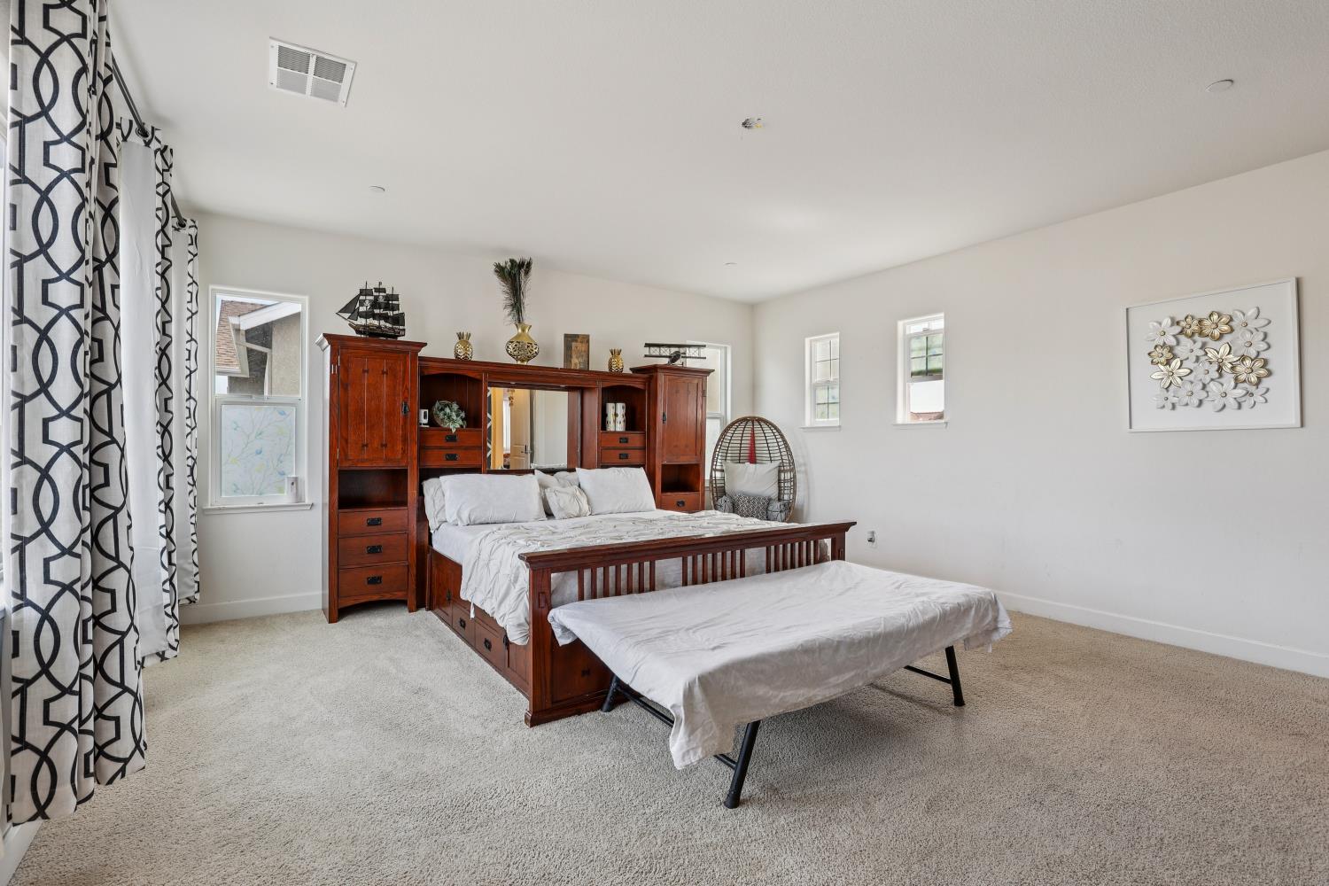 2371 Rio Grande Drive Tracy, CA 95377 - Photo 38 of 61 a living room with furniture and a table