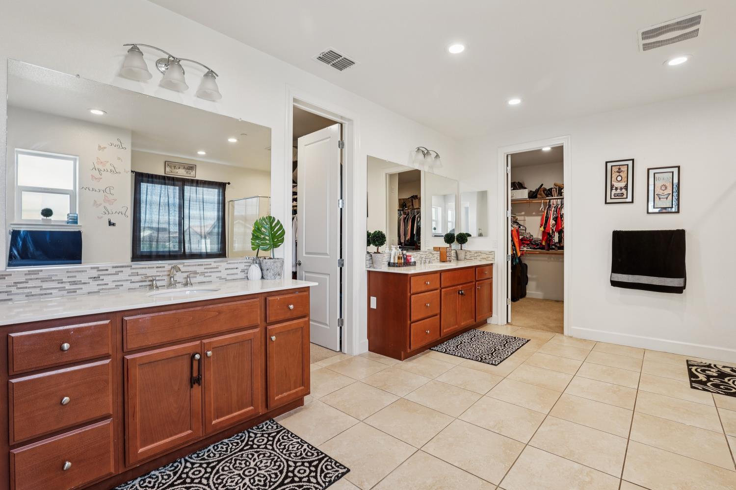 2371 Rio Grande Drive Tracy, CA 95377 - Photo 39 of 61 a large kitchen with stainless steel appliances kitchen island granite countertop a refrigerator and a sink