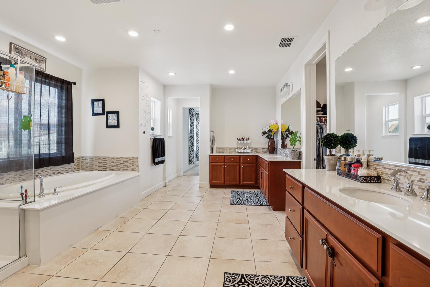 2371 Rio Grande Drive Tracy, CA 95377 - Photo 41 of 61 a large white kitchen with a sink and cabinets
