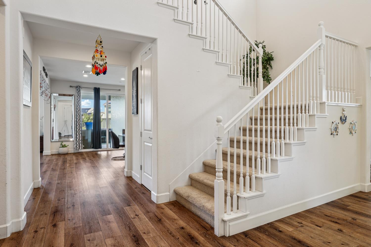 2371 Rio Grande Drive Tracy, CA 95377 - Photo 6 of 61 a view of entryway and hall with wooden floor