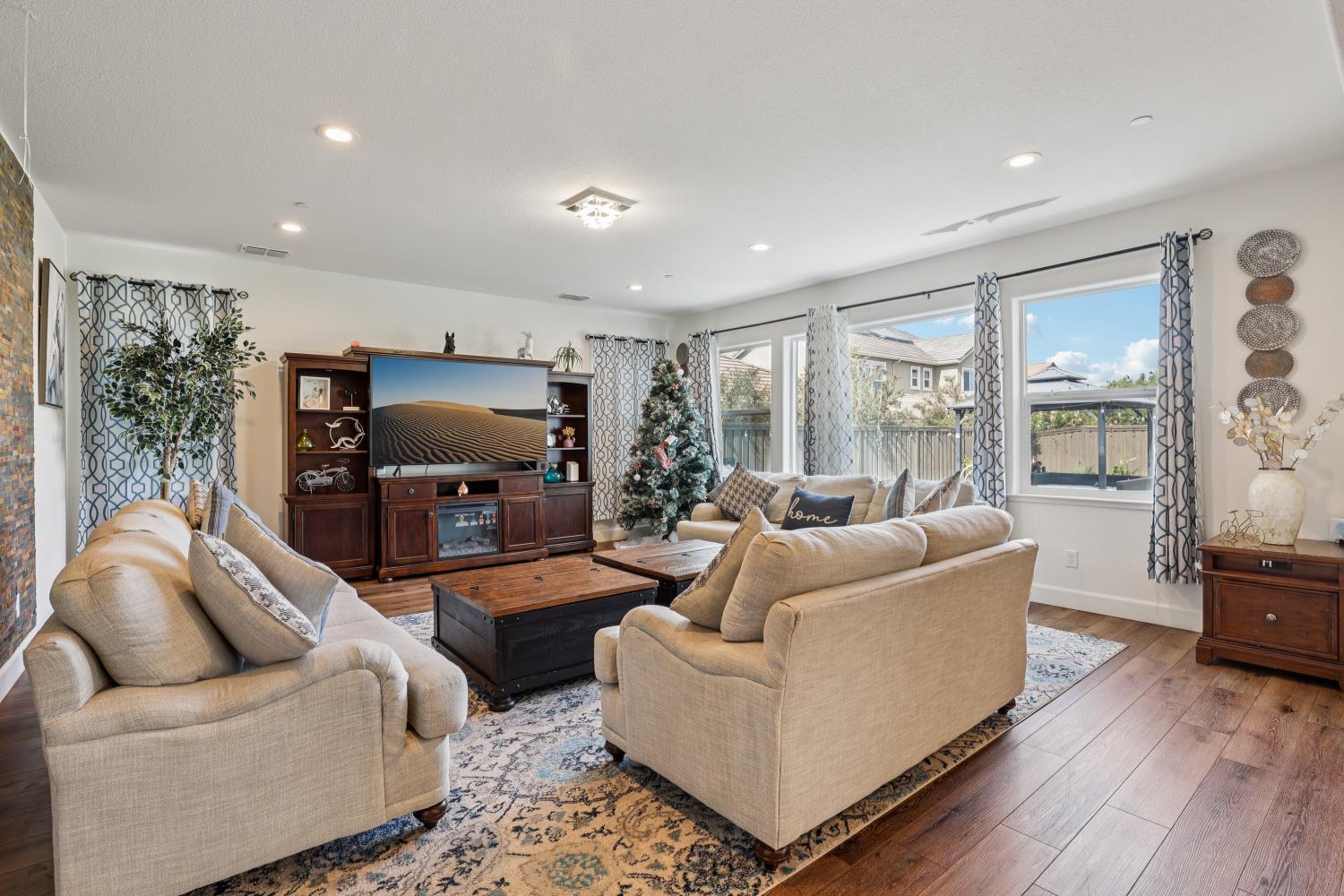 2371 Rio Grande Drive Tracy, CA 95377 - Photo 7 of 61 a living room with furniture and a flat screen tv
