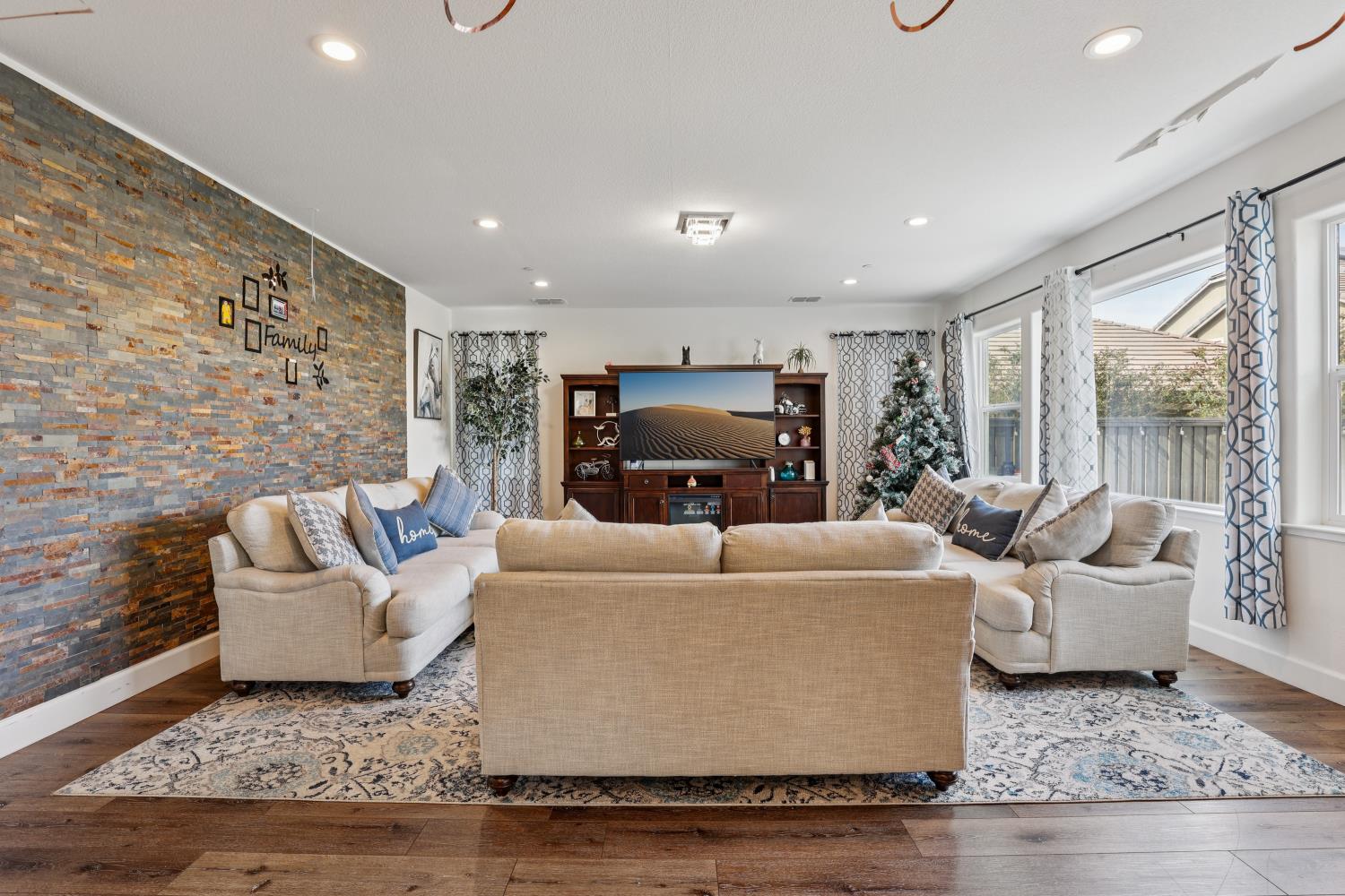 2371 Rio Grande Drive Tracy, CA 95377 - Photo 9 of 61 a living room with furniture and a fireplace
