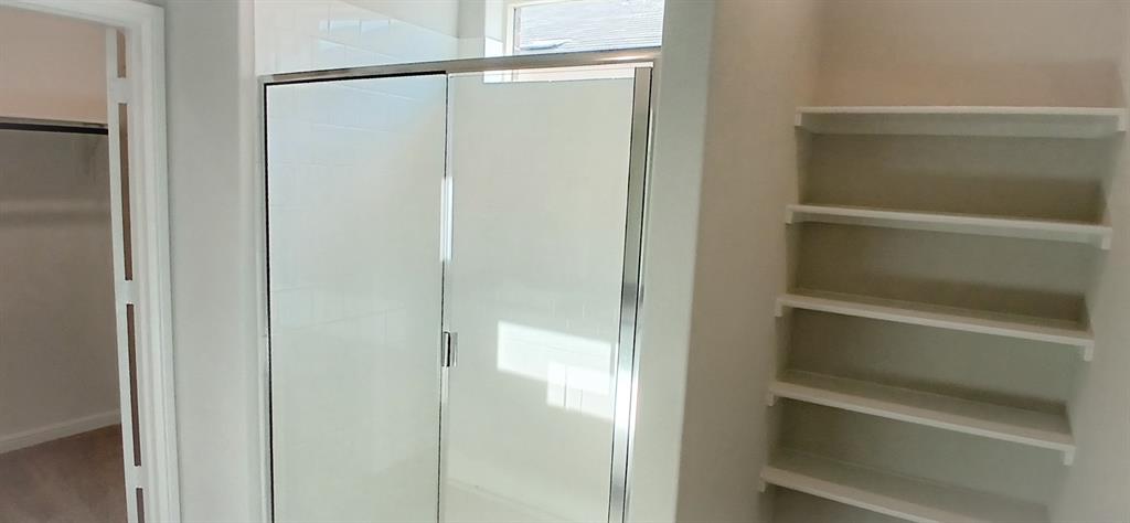 525 Pendleton Avenue Keene, TX 76059 - Photo 5 of 15 a view of walk in closet with empty racks