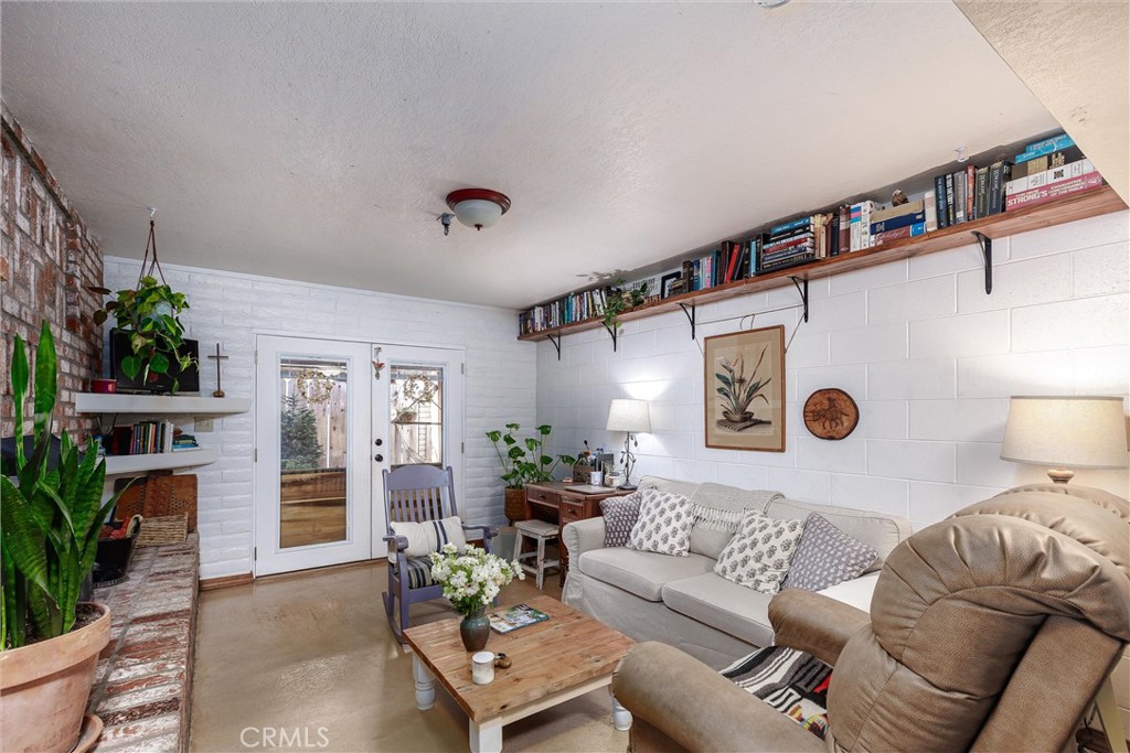 1228 7th Street Los Osos, CA 93402 - Photo 18 of 44 a living room with furniture and a table