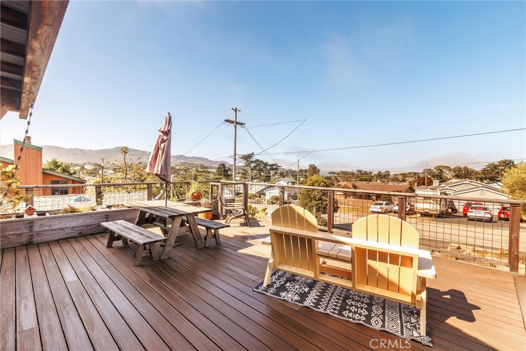 1228 7th Street Los Osos, CA 93402 - Photo 10 of 44 a view of a balcony with wooden floor