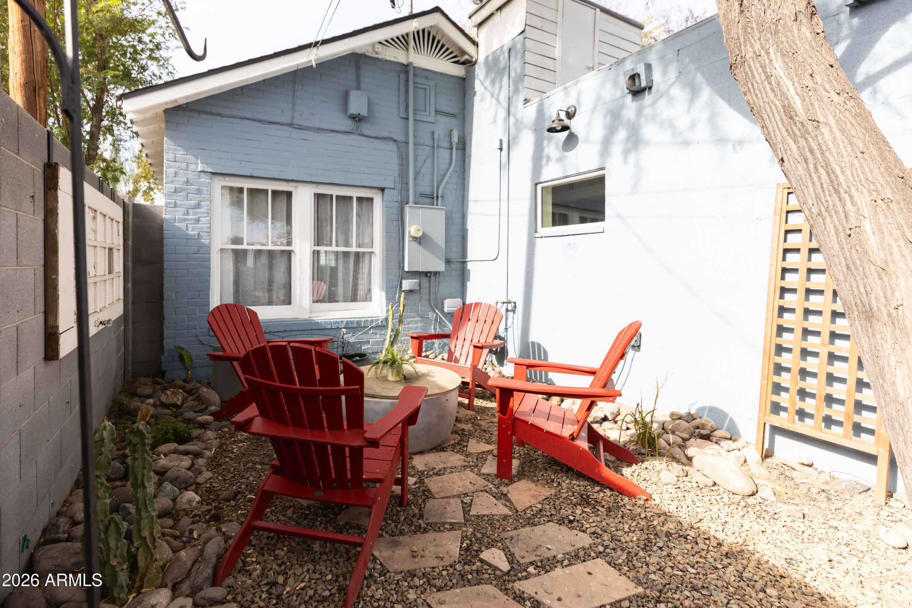 3715 North 9th Place Phoenix, AZ 85014 - Photo 38 of 41 a backyard of a house with table and chairs