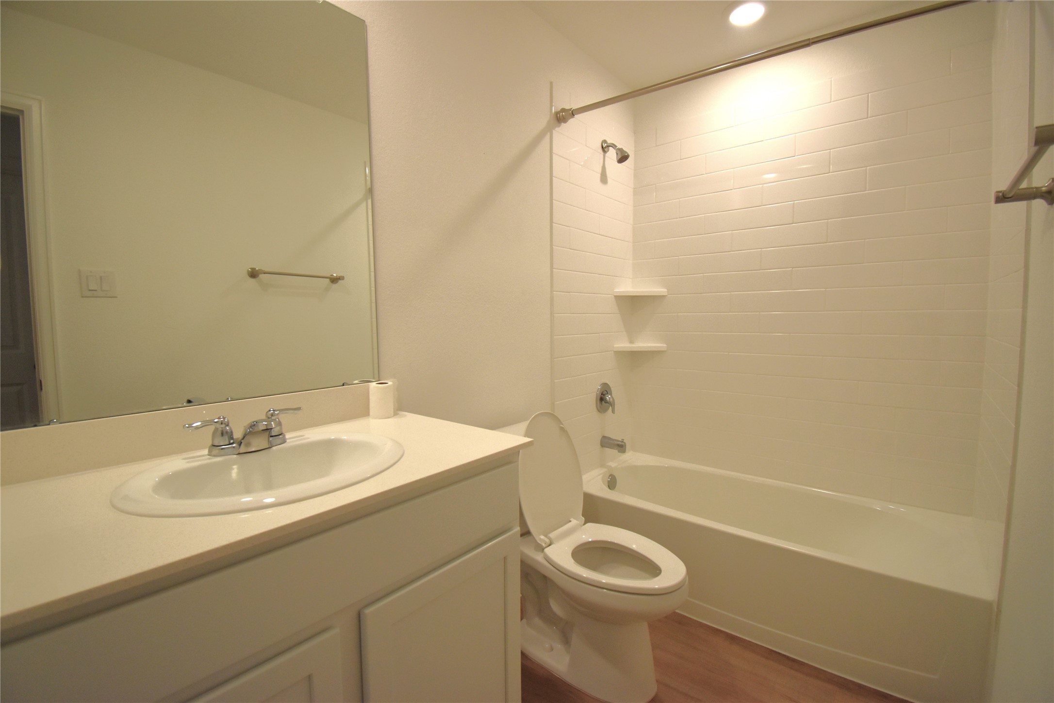 3326 Spanish Oak Lane Rosenberg, TX 77471 - Photo 17 of 24 a bathroom with a sink a toilet and shower
