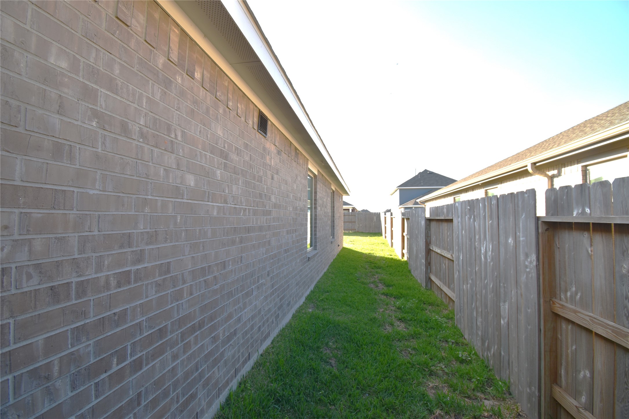 3326 Spanish Oak Lane Rosenberg, TX 77471 - Photo 22 of 24 a view of a backyard with pathway